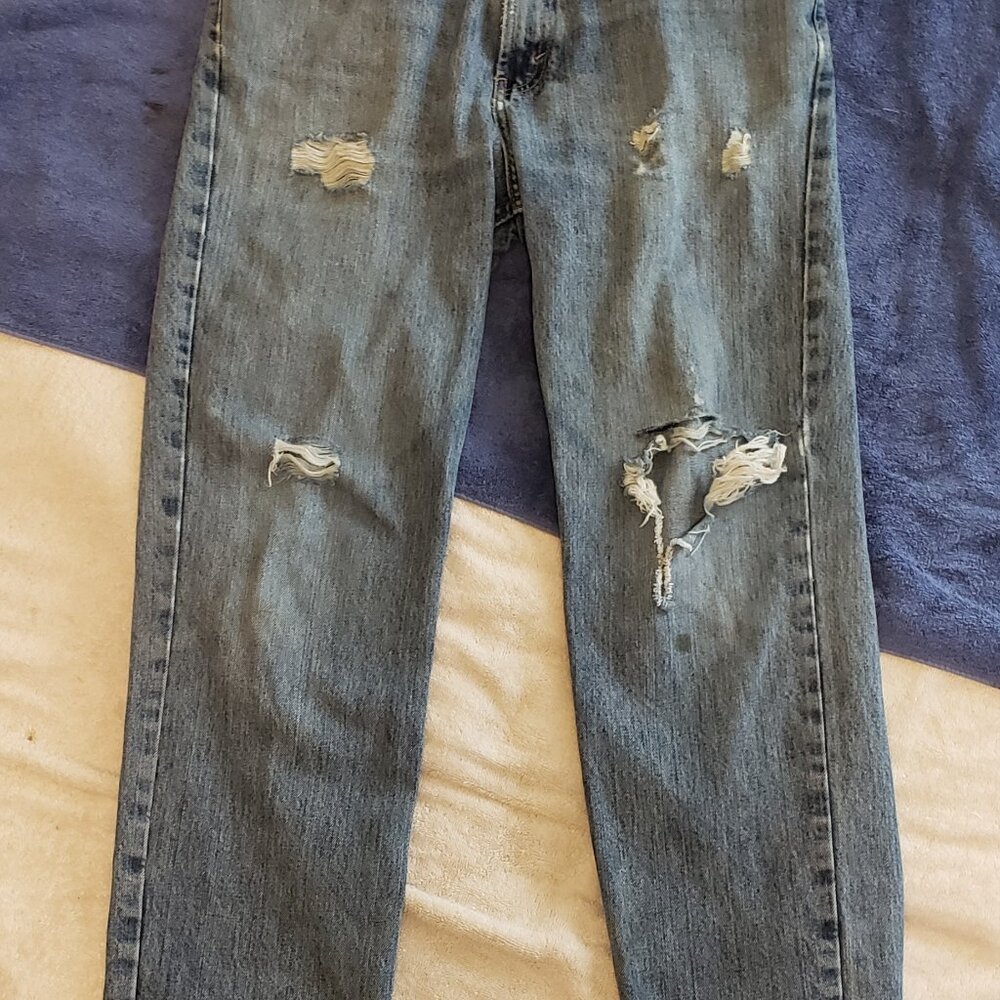 Used torn jeans